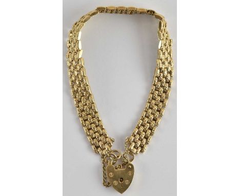 A 9ct gold gate bracelet, with 9ct gold heart shaped padlock clasp, length 22cm, approx 22.2g.