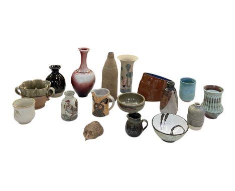 † A collection of seventeen pieces of studio ceramics, including a florally decorated ceramic bottle by Colin Kellam height 1