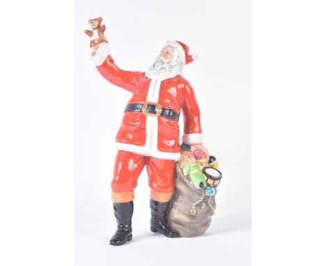 Royal Doulton - Santa Claus - HN2725 - a hand painted ceramic figure / figurine of Father Christmas with his sack of toys,&nb