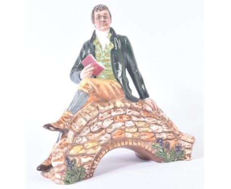 Royal Doulton – Robert Burns - HN3641 - a hand painted ceramic figure / figurine of Robert Burns sitting on a stone bridge wi