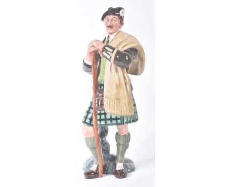 Royal Doulton – The Laird – HN2361 – a hand painted ceramic figure / figurine of a laird with crook on naturalistic plinth. M