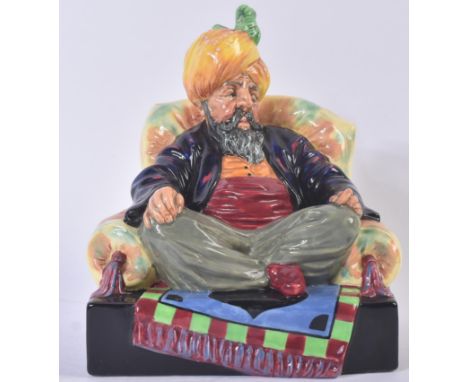 Royal Doulton – Abdullah - HN2104 - a hand painted ceramic figure / figurine of a seated cross legged Middle Eastern gentleme