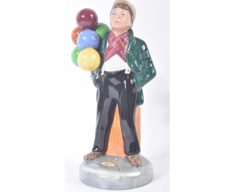 Royal Doulton – Balloon Boy - HN2934 - a hand painted ceramic figure / figurine of a young boy standing with his hands in his