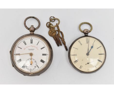 TWO SILVER OPEN FACE POCKET WATCHES, both key wound, the first with a round white dial signed 'The Express English Lever, J.G