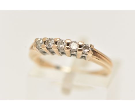 A 9CT GOLD DIAMOND FIVE STONE RING, designed with a row of five small round brilliant cut diamonds, in a shared claw setting,