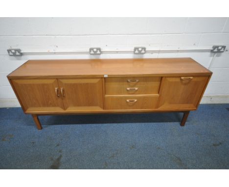 G PLAN, A MID CENTURY TEAK SIDEBOARD, fitted with double cupboard doors, three drawers, and a fall front door, length 206cm x