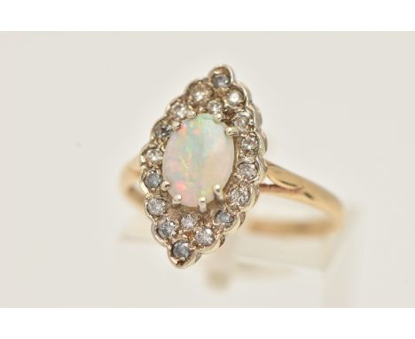 A 9CT GOLD OPAL AND DIAMOND CLUSTER RING, of a marquise form, set to the centre with an oval cut white opal cabochon, in an e