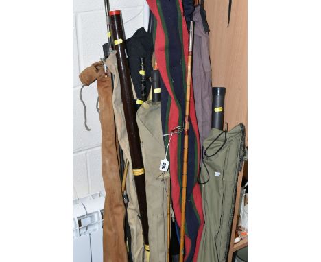 A LARGE COLLECTION OF VINTAGE FISHING RODS, comprising a split cane 'Black Seal' 7432 rod, a 6m Middy 'White Knuckle' CX-Seri
