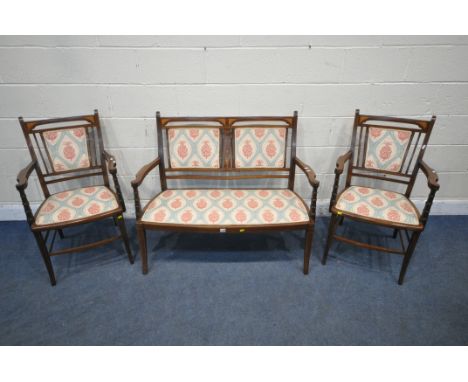 AN EDWARDIAN MAHOGANY AND INLAID THREE PIECE PARLOUR SUITE, comprising a two seater sofa, with open armrests, turned supports