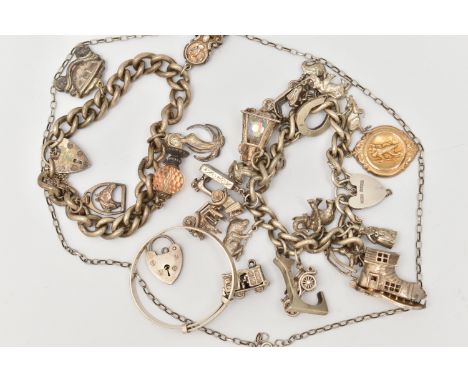 TWO SILVER CHARM BRACELETS, the first a silver curb link chain, fitted with a heart padlock clasp, hallmarked Birmingham, fit