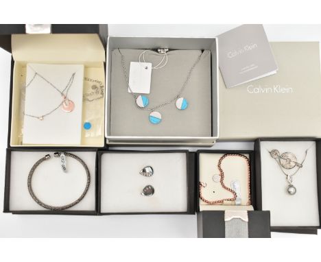 AN ASSORTMENT OF JEWELLERY, to include two silver and gold plated 'Waterford' necklaces, fitted with lobster clasps and exten