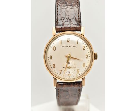 A BOXED GENTS 9CT GOLD 'SMITHS ASTRAL' WRISTWATCH, manual wind, round silvered dial signed 'Smiths Astral', Arabic numerals, 