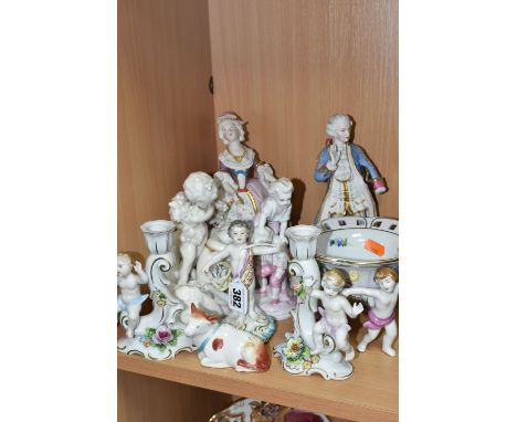 A GROUP OF CERAMIC FIGURES, to include a pair of Unterweissbach figural candlesticks with putti, a hand painted bon bon dish 