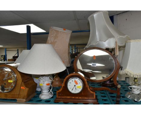 A COLLECTION OF LAMPS, CLOCKS AND A MIRROR, a foreign art deco mantel clock light wood with key, art deco mantel clock dark w