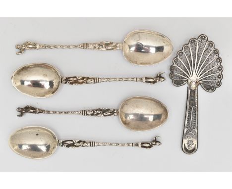 FIVE SPOONS, to include a filigree caddy spoon and four matching small spoons with figures on each terminal, approximate leng