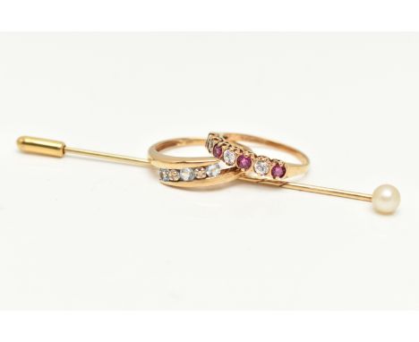 TWO 9CT GOLD RINGS AND A STICK PIN, the first a yellow gold aquamarine and diamond bypass ring, hallmarked 9ct Birmingham, ri