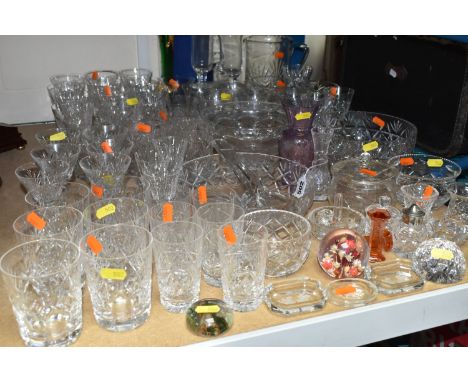 A GROUP OF GLASSWARE comprising whisky tumblers, sherry glasses, wine glasses, fruit bowls, a water jug, a ring dish, various