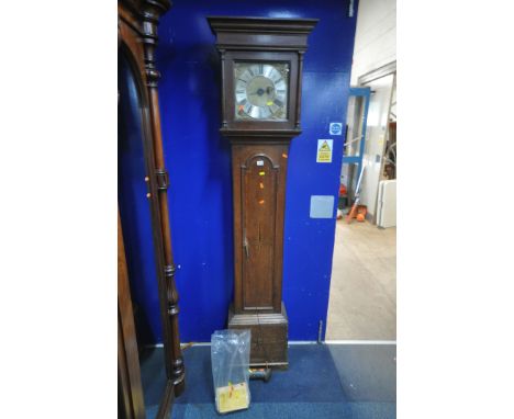 A GEORGIAN OAK 30 HOUR LONGCASE CLOCK, the box hood with a square glass door that's enclosing a 10'' brass and silvered dial,