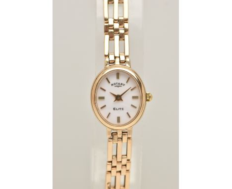 A LADIES 9CT GOLD 'ROTARY' WRISTWATCH, quartz movement, oval white dial signed 'Rotary Elite', baton markers, in a polished c