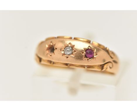 AN EARLY 20TH CENTURY, 18CT GOLD GEM SET RING, three star set mounts set with a central single cut diamond, flanked with a ci
