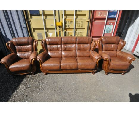 A MODERN BROWN LEATHER THREE PIECE LOUNGE SUITE, comprising a three seater sofa, length 199cm x depth 100cm x height 102cm (c