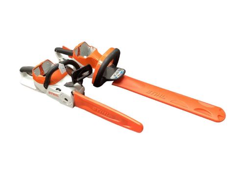Stihl HSA 56 cordless hedge trimmer together with Stihl MSA 120 C cordless Chainsaw with charger