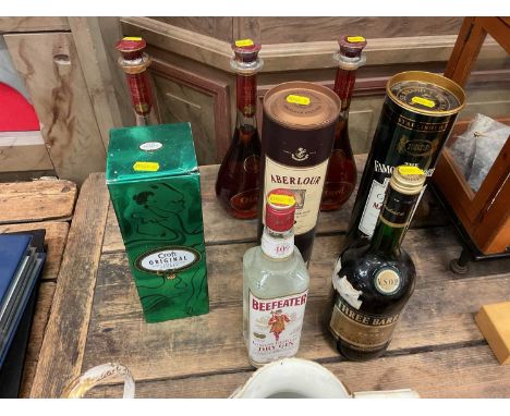 Eight bottles of spirits to include Otard Cognac, Beefeater Gin and others.
