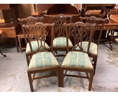Set five mahogany Chippendale revival dining chairs with carved and pierced splat backs
