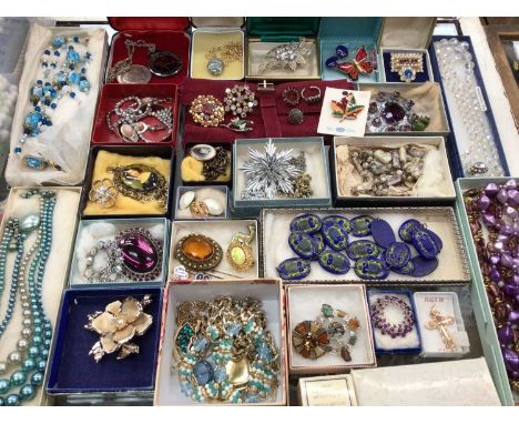 Group of vintage costume jewellery including bead necklaces, brooches etc