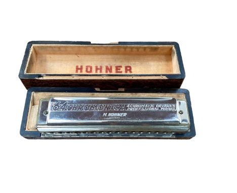 Hohner Chromonica in fitted case, cigarette cards, postcards, packs of playing cards, two children's books and other items - 