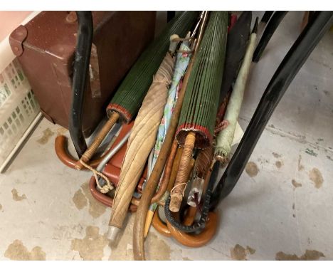 Vintage case together with parasols and shooting stick