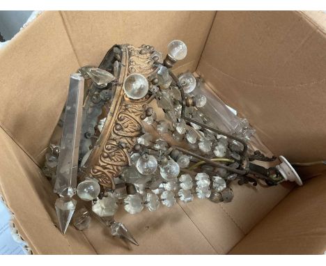 Early 20th century gilt metal ceiling light with prismatic drops.