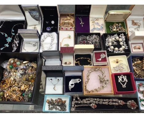 Group of costume jewellery including a pair of vintage Christian Dior stud earrings, a Miracle necklace and brooches, Rotary 