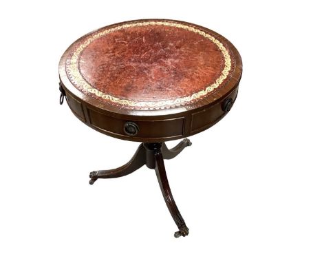 Reproduction mahogany drum table with inset leather lined top, together with a similar sofa table with single drawer (2)