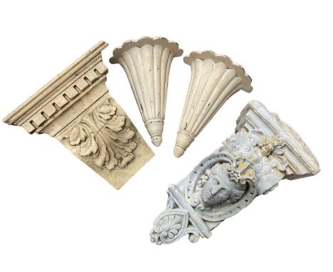 Four decorative corbels / brackets, including a Victorian stone corbel with carved mask, 45cm high, three wooden examples