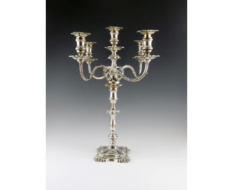 A single silver five-light candelabrum, by Hawksworth, Eyre and Company, Sheffield 1912, knopped stem with shell shoulders, o