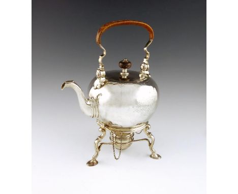 A George II silver kettle on stand, by Edward Pocock, London 1730, circular form, flush-hinged cover with a knop finial, hing