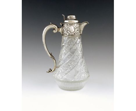 A late Victorian silver mounted glass claret jug, by W & C Sissons, Sheffield 1900, tapering glass circular body with swirled