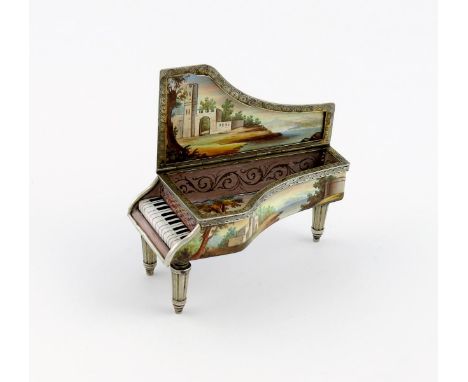 An Austrian silver-gilt and enamel piano, apparently unmarked, the hinged cover and sides decorated with figural and landscap