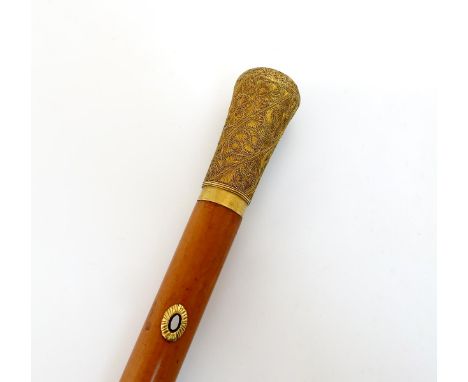 A fine 18th century gold filigree mounted swagger stick, unmarked circa 1770-80, tapering circular form, with scroll filigree