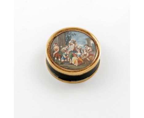 λA late 18th century French gold mounted green lacquered portrait snuff box, Paris circa 1797, circular form, the base and co