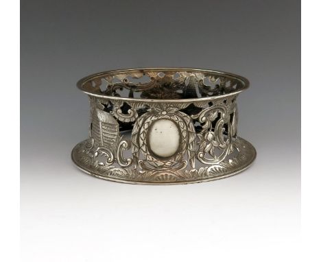 A Victorian silver dish ring, by D and J Wellby, London 1893, waisted circular form, pierced and embossed with foliate scroll