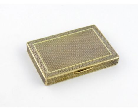 A silver-gilt box, by J. W. Benson Ltd, London 1919, rectangular form, engine-turned decoration, Greek key border, length 10.