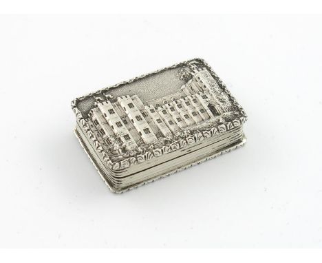 A Victorian silver 'castle-top' vinaigrette, Kenilworth Castle, by Nathaniel Mills, Birmingham 1837, rectangular form, the co