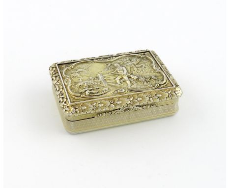 A George IV silver-gilt snuff box, by Alexander Strahan, London 1824, rectangular form, the hinged cover with a relief of a h
