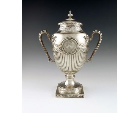 A George III silver two-handled cup and cover, by Thomas Heming, London 1770, vase form, part fluted decoration, applied drap