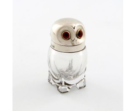 A late-Victorian novelty silver-mounted owl smelling salts bottle, by William Hutton and Sons, London 1894, modelled in a sta