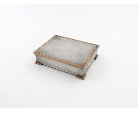 A modern silver cigarette box, by Garrard and Co, Birmingham 1958, rectangular form, engine-turned decoration, with applied g