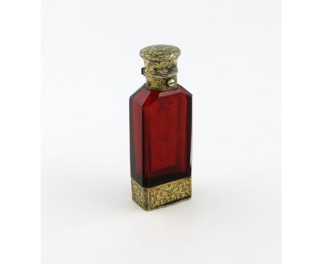 A Victorian silver-gilt mounted red glass scent bottle / vinaigrette, by S. Mordan, London 1873,  rectangular form, canted co