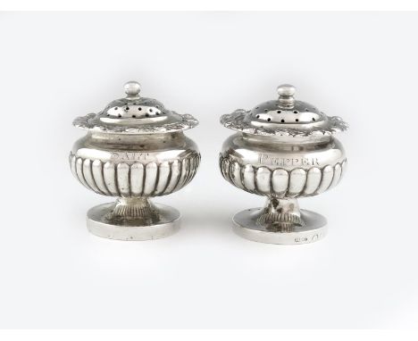 A pair of 19th century Indian Colonial silver salt and pepper casters, by Hamilton and Co, Calcutta, circa 1850, also marked 